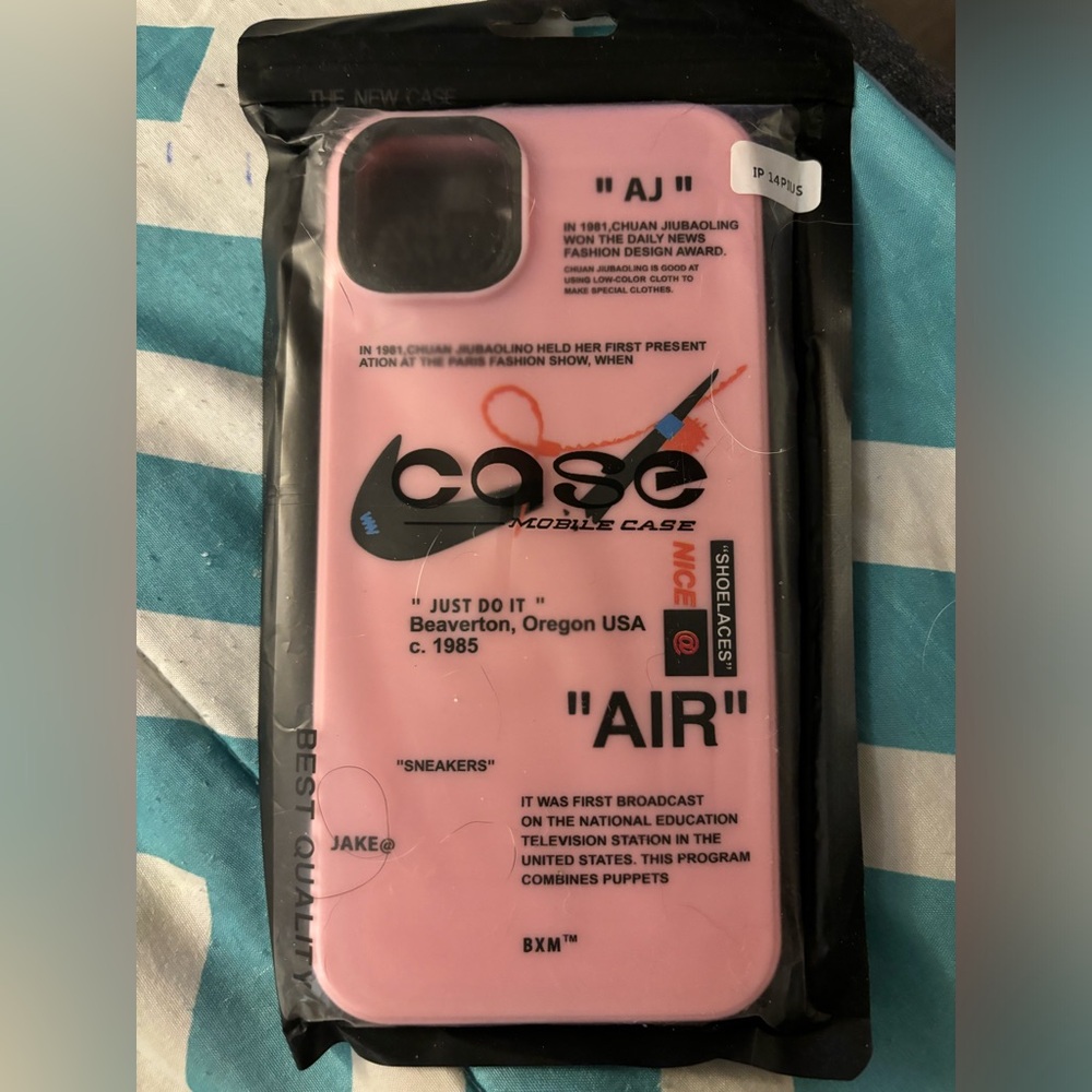 Pink Nike IPhone case for 14 plus.  In original packaging